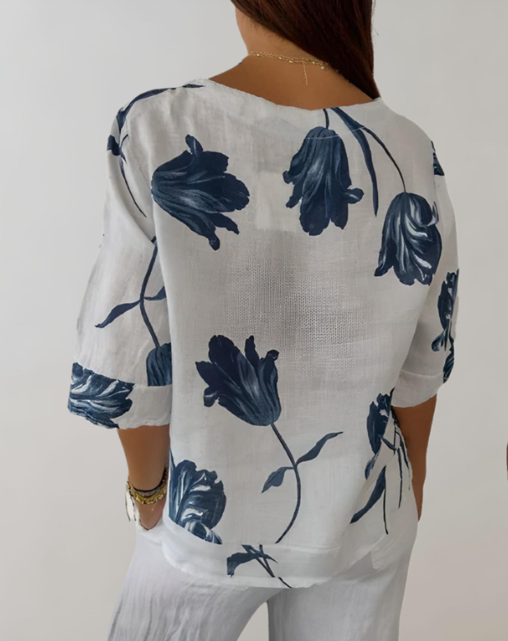 Top ample à manches 3/4, motif floral et fermeture à boutons