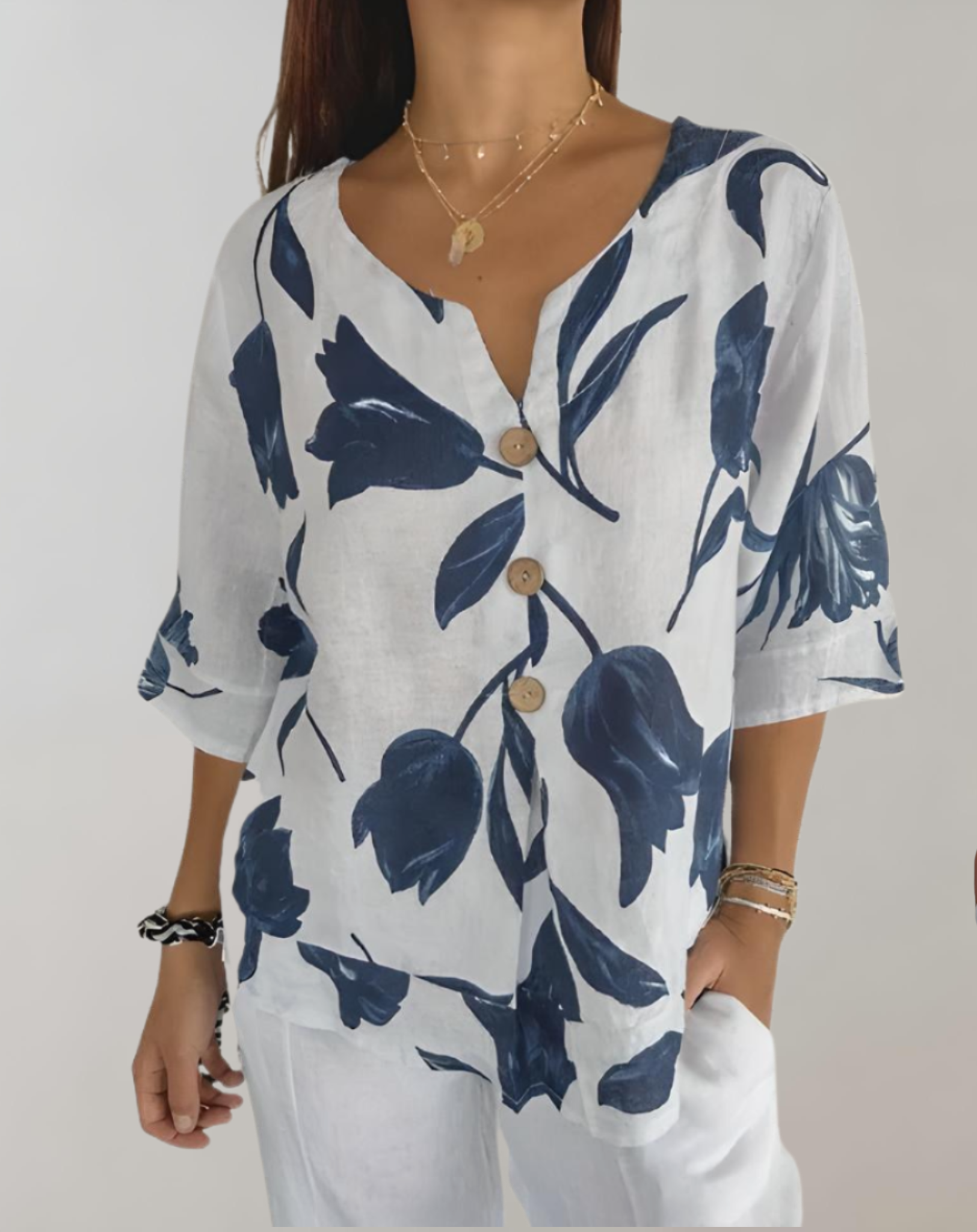 Top ample à manches 3/4, motif floral et fermeture à boutons