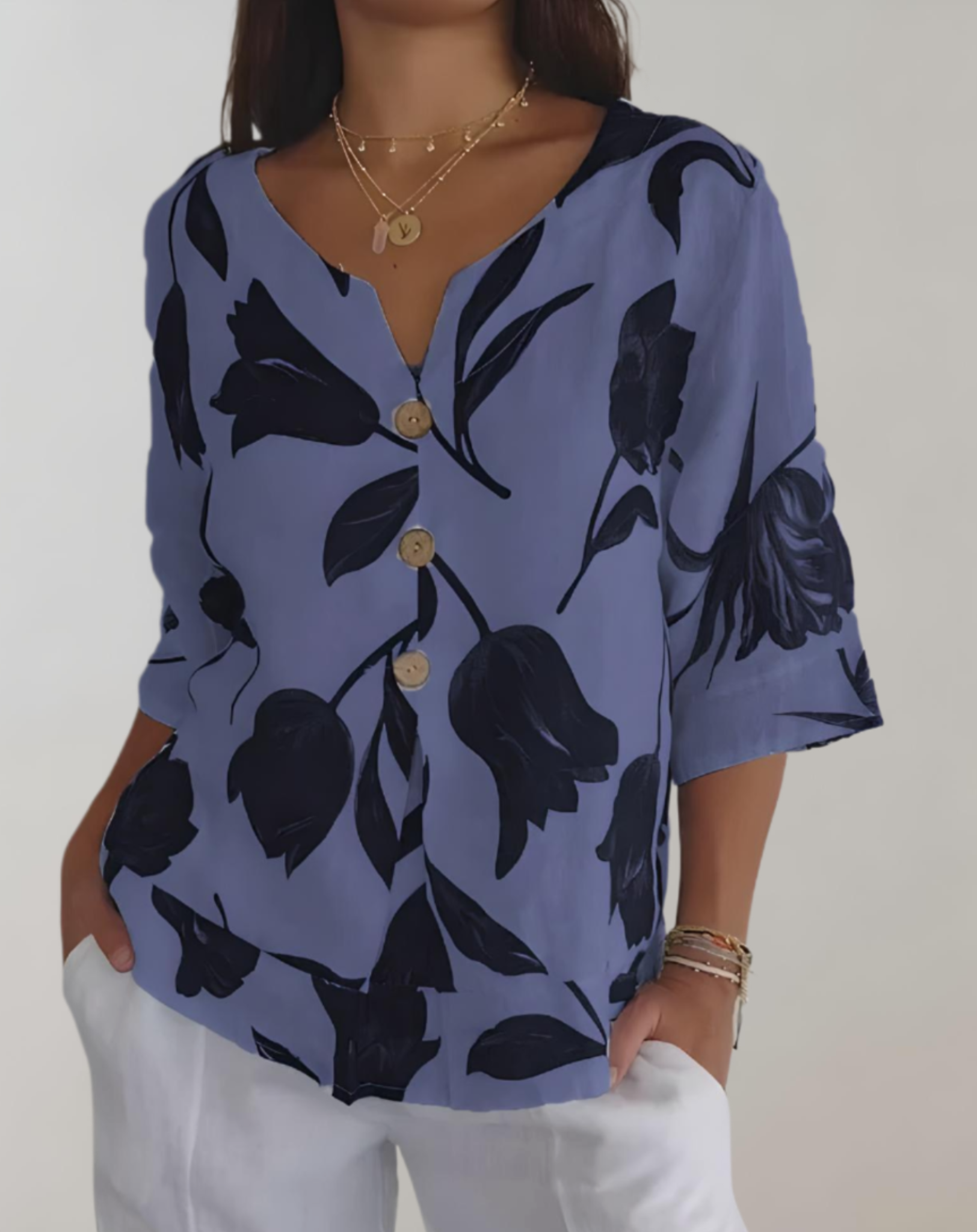 Top ample à manches 3/4, motif floral et fermeture à boutons