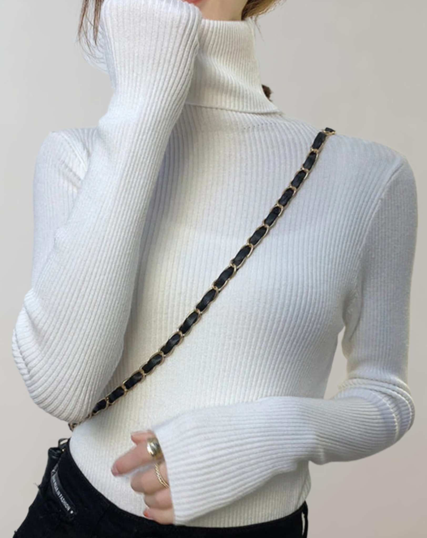 Pull à col roulé étroit et simple avec motifs côtelés